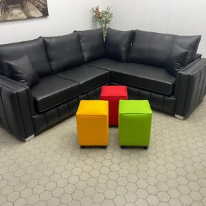 Modern Black Leather Corner Sofa with Vibrant Accent Stools