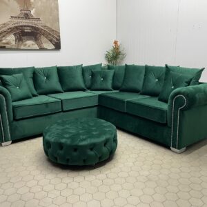 Contemporary Corner Sofa with Silver Accents and Circular Pouffe