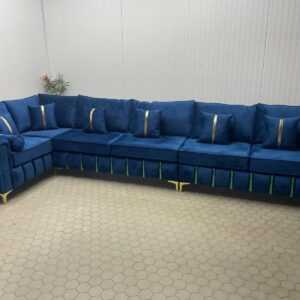 Large Blue L-Shaped Sofa with Gold Detailing