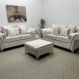 Pair of Luxurious Sofas with Bolster Cushions, Tassel Detailing and Tufted Pouffe