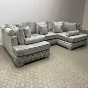 Silver U-Shaped Corner Sofa with Cushions and Bolster Accents