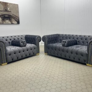 Pair of Dark Grey Chesterfield Sofas with Gold Accents